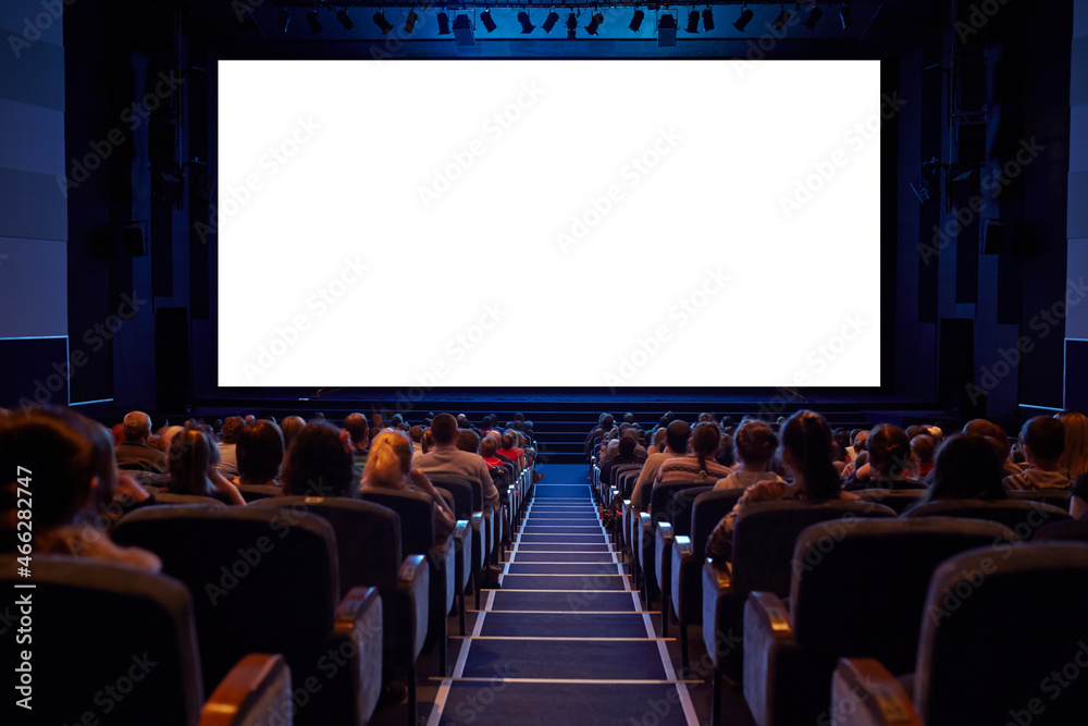 White cinema screen with audience. - obrazy, fototapety, plakaty 