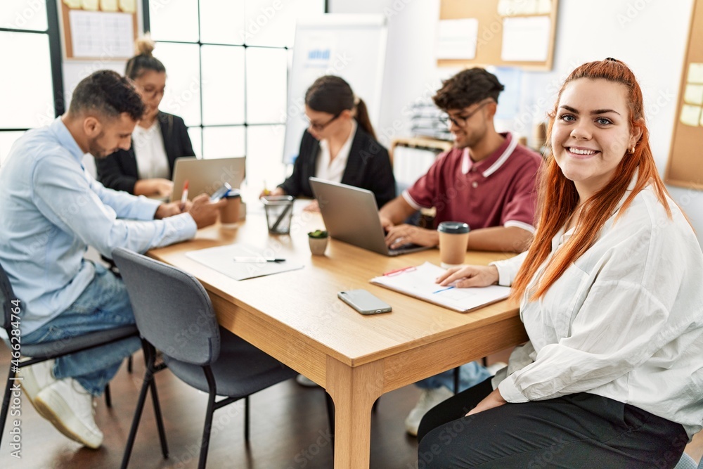 Group of business workers smiling happy working at the office Group of business workers smiling happy working at the office