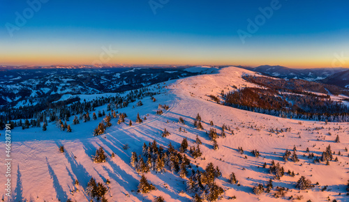 Wonderful landscapes of the Carpathian mountains covered with the first snow in Ukraine near the village of Pylypets
