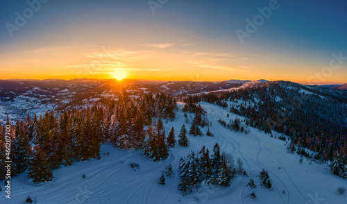 Picturesque winter panorama of mountain hills