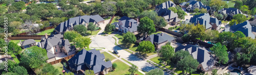 Panoramic top view expensive two story mansion houses with swimming pools near a cul-de-sac in Grapevine, Texas, USA