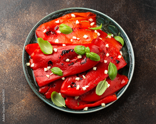 Baked, Roasted Red pepper on grill. Healthy vegetables photo