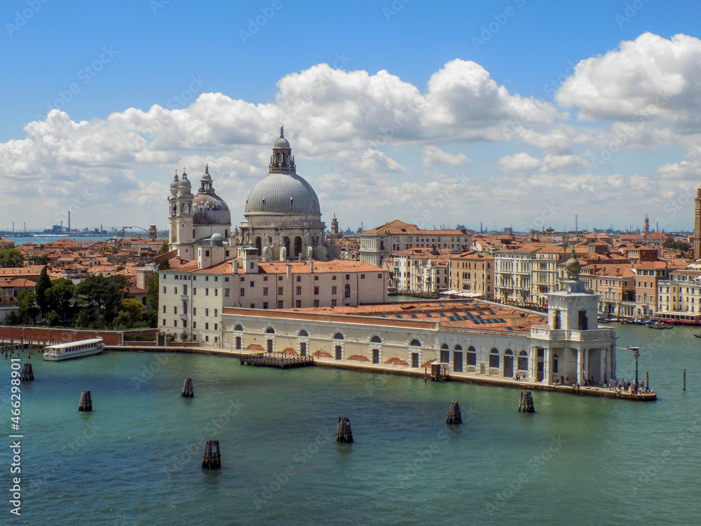 The Cityscape of Venice Italy as a Cruise Ship Sails Through the Harbor Channel