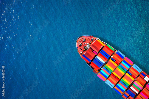 Aerial view of container cargo ship in sea. © tawatchai1990