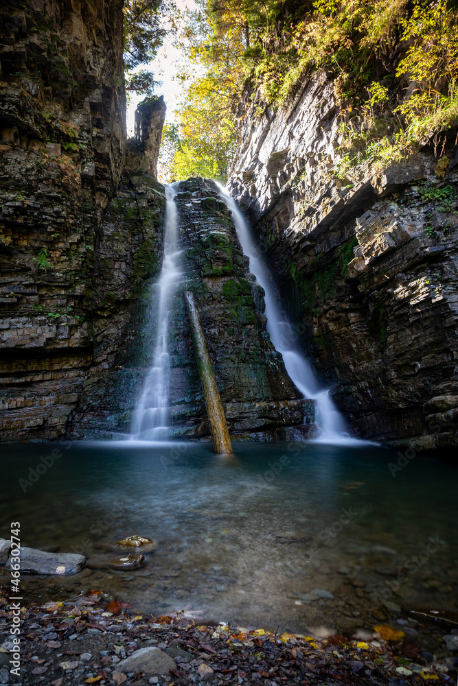 Obraz premium Beautiful waterfall among the canyon in the Carpathian mountains.