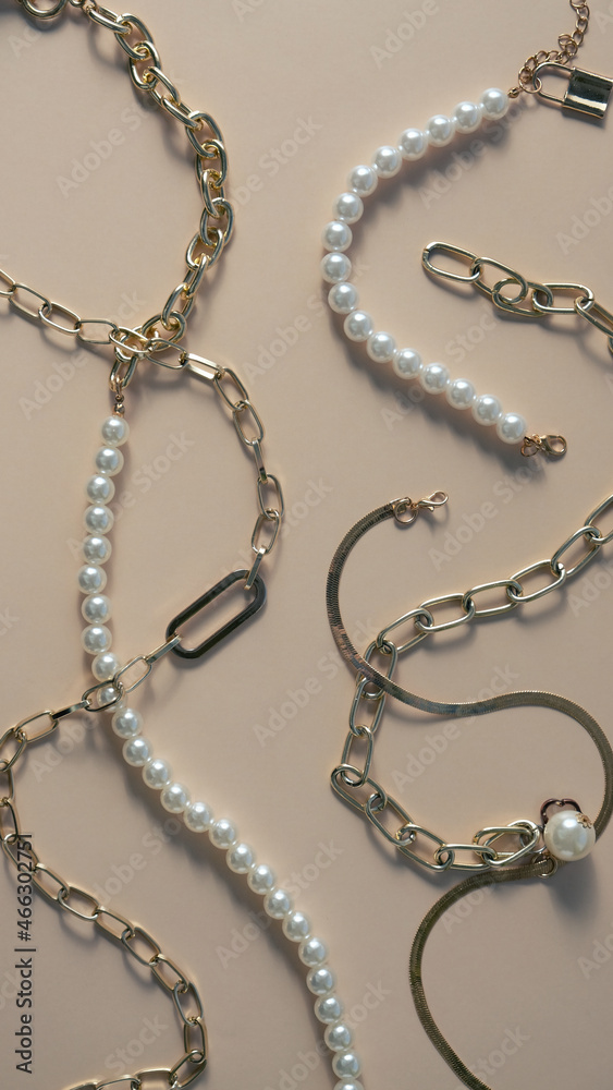 Women's jewelry and other stuff on a neutral background Women's jewelry and other stuff on a neutral background