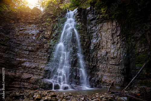 Beautiful waterfall among the canyon in the Carpathian mountains. Manyavsky waterfall.