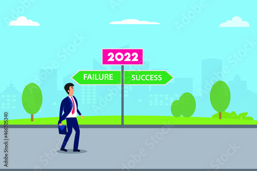 Young businessman looks confused while standing between success or failure directions in 2022