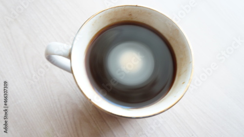 cappuccino coffee with froth in a porcelain cup