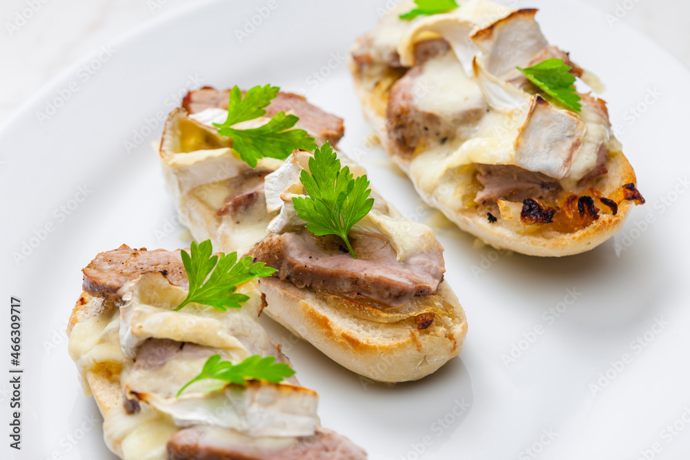 baguette baked with meat, onion and cheese baguette baked with meat, onion and cheese