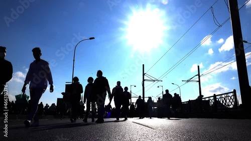 People walking in the big street timelapse. Silhouette of pedestrian crowd walking towards camera. Sunny autumn day.