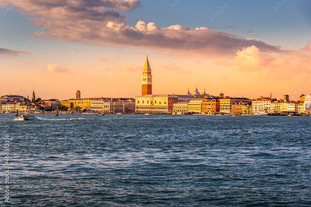 Venice city morning sunrise skyline. Cityscape Venice, sea view Piazza San Marco with Campanile, Doge Palace in Venice, Italy.