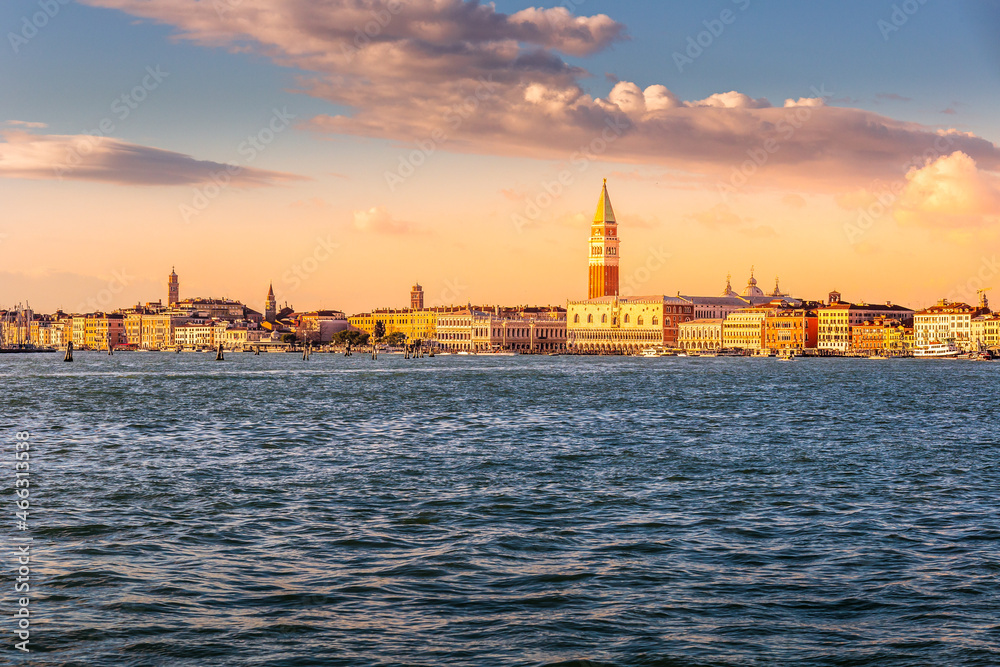 Venice city morning sunrise skyline. Cityscape Venice, sea view Piazza San Marco with Campanile, Doge Palace in Venice, Italy.