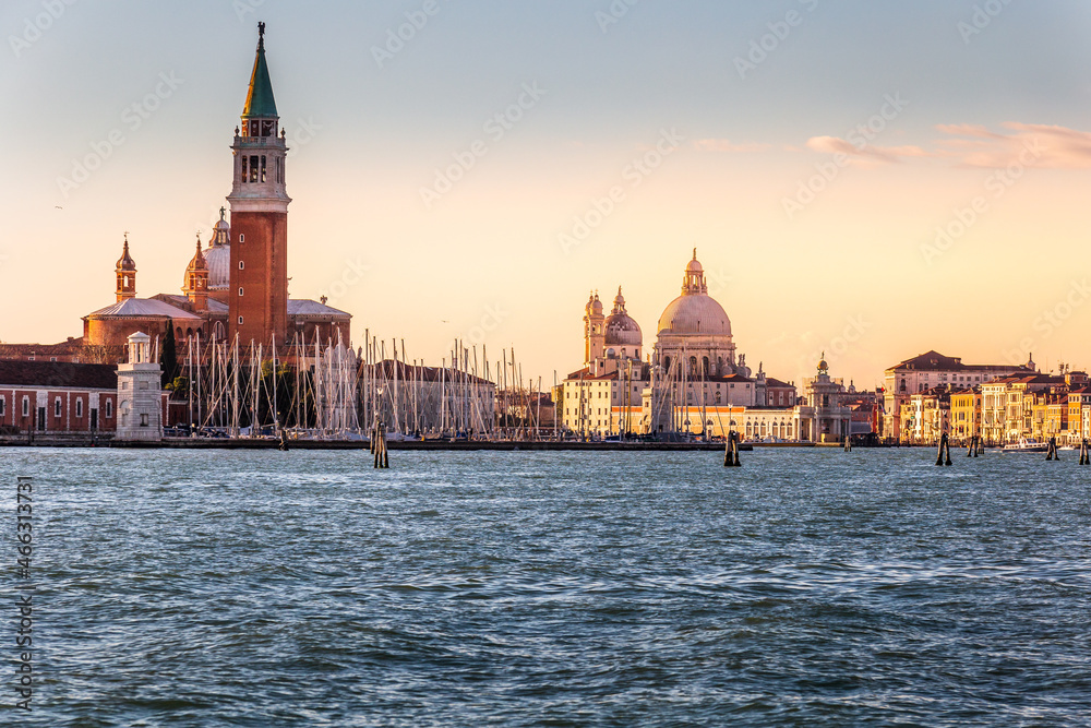 Panoramic view of famous Canal Grande with San Giorgio Maggiore island and Basilica di Santa Maria della Salute in the background, Venice, Italy