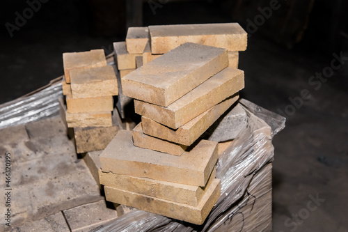 Fotografie A bunch of refractory bricks, fire-resistant brick blocks