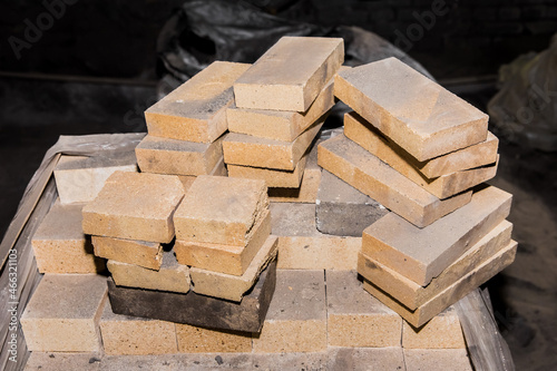 A bunch of refractory bricks, fire-resistant brick blocks photo