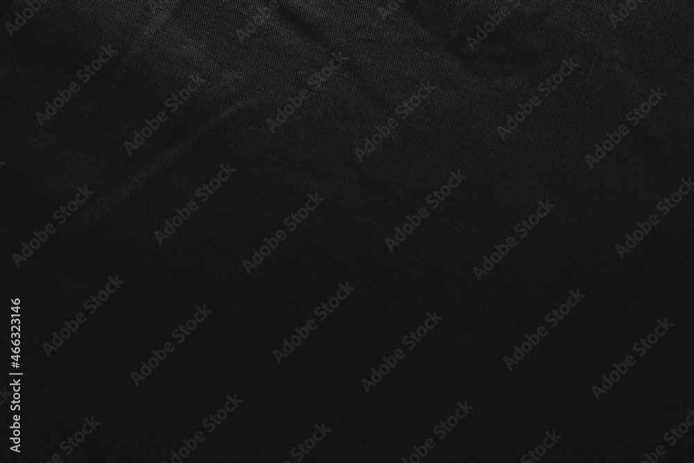 Dark background of black fabric texture pattern. Low key