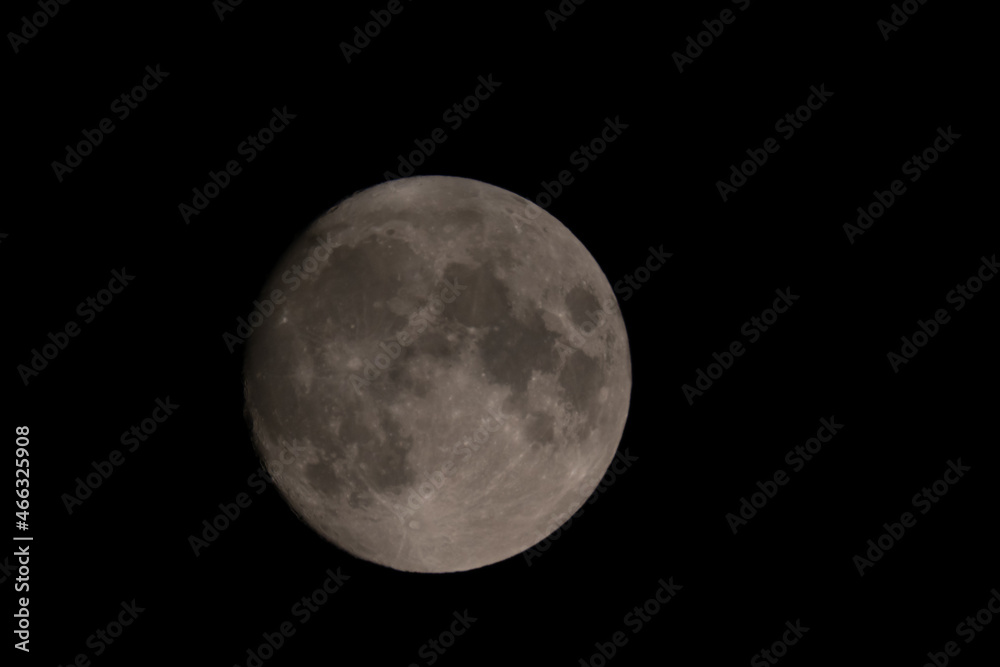 Liechtenstein, July 22, 2021 Full moon in the dark sky Liechtenstein, July 22, 2021 Full moon in the dark sky
