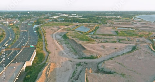 27 JUN 2021 Sayreville NJ USA: Aerial top view of huge complex road junction at cars driving on the Alfred E. Driscoll Bridge across the Raritan River New Jersey USA photo