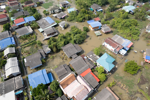 Aerial View of Houses Sunk Under the Water From Severe Flood in Pathum Thani Thailand © charnsitr