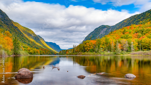 Wonderful and colorful Jacques-Cartier valley and its vibrant foliage at Fall, Jacques-Cartier national park, Quebec, Canada photo