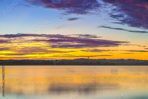 Sunrise over the river photo