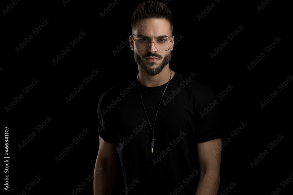 attractive cool young man with beard wearing eyeglasses attractive cool young man with beard wearing eyeglasses