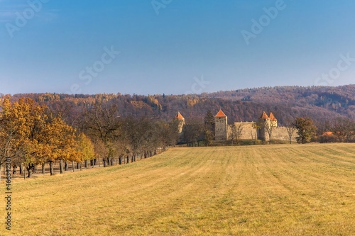 Veveri castle in South Moravia, Czech Republic. Medieval castle built in the 13th century. View from the south side. Sunny autumn day.