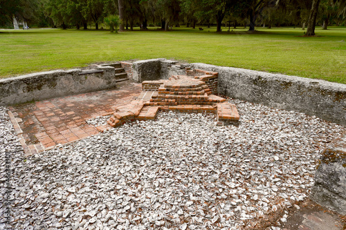 Fort Frederica National Monument, Georgia. Archaeological remnants of Calwell house, the best dwelling in town belonged to the soap and candle maker who kept a shop. Foundation and fire place hearth. photo