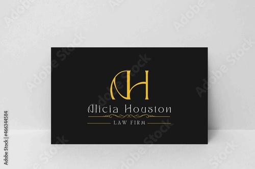 black and gold letter A and H for personal lawyer logo design