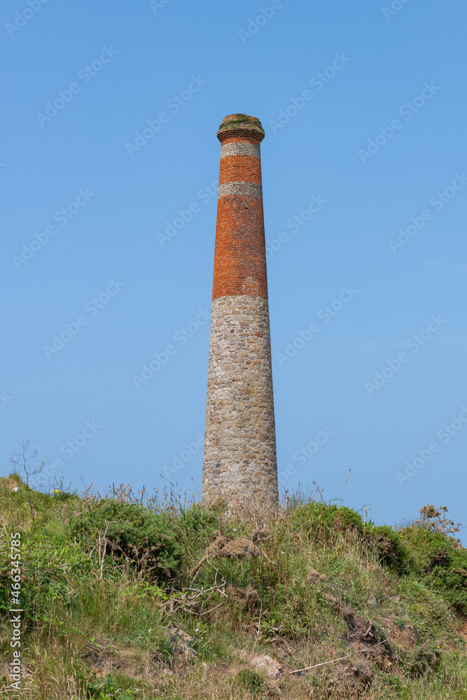 View of a chimney at Botallack mine in Cornwall View of a chimney at Botallack mine in Cornwall
