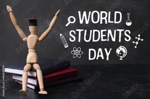 Greeting card for World Students Day with mannequin and books