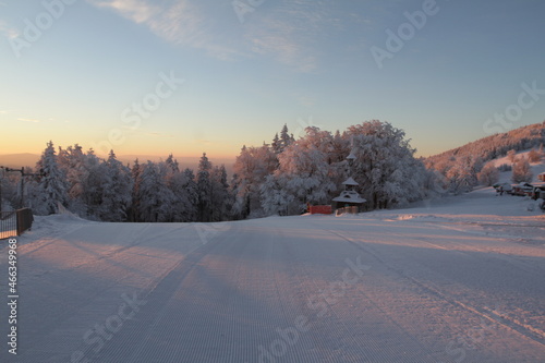 Frozen morning at moutains with first snow ski slope downhill course  dawn daybreak © Vaclav N.