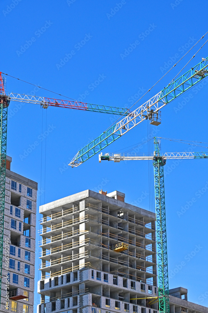 Crane and highrise construction site