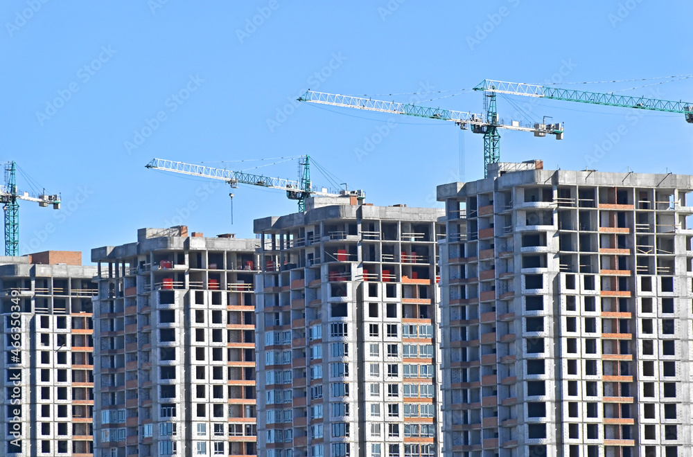 Crane and highrise construction site Crane and highrise construction site