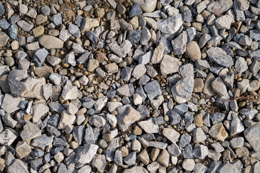 Crushed stones background on the railway. Close up stone texture, Crushed stone, railway ballast. Stones background. Crushed stones background on the railway. Close up stone texture, Crushed stone, railway ballast. Stones background.