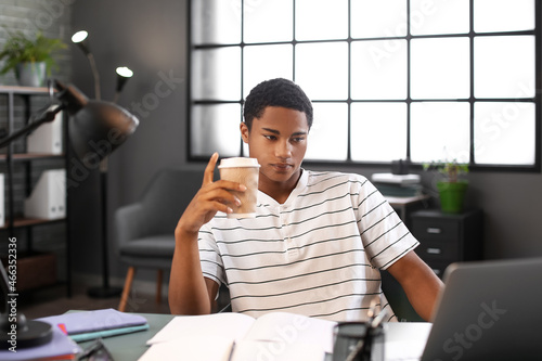 African-American student preparing for exam at home