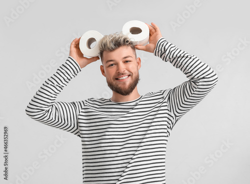 Funny young man with toilet...