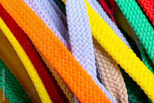 Colorful shoe laces as background, closeup