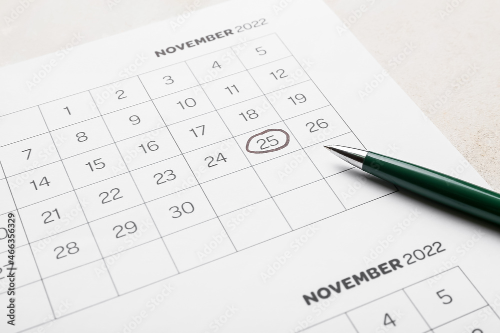 Calendar page with marked date of Black Friday on white background, closeup Calendar page with marked date of Black Friday on white background, closeup
