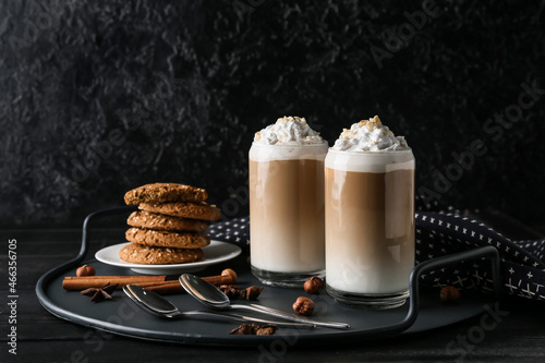 Glasses of tasty latte with...