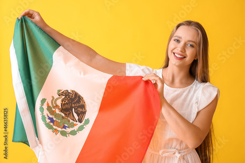 Happy young woman with flag...