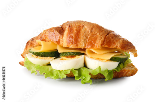 Delicious croissant sandwich with egg on white background