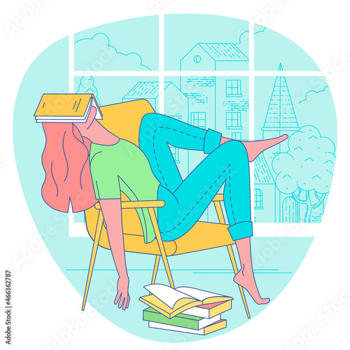 Tired on the sofa with a book