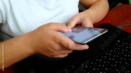 Girl using smartphone close up sliding screen, pressing with finger, surfing internet, social media, shopping online, typing text. Chatting, communicating and play via mobile phone in two hands