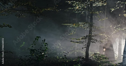 Mysterious woman walking in night forest