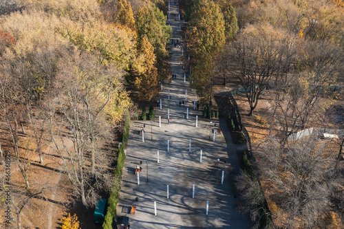 Alley in Warsaw Insurgents Park next to Wolski Cemetery in Wola district of Warsaw, Poland photo