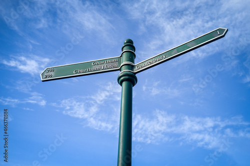 Direction arrow sign for Chartham Hatch and Canterbury on footpath at Hambrook Marshes, Canterbury, Kent. photo