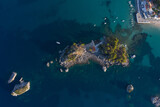 Aerial shot of church on island at the port town of Parga in West Greece Preveza