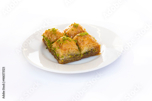 Traditional Turkish baklava, cut into four slices